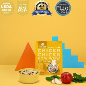 A pup above Chicka chicka bow wow Grain free